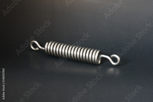 spring and wire forming for industrial use on black background.