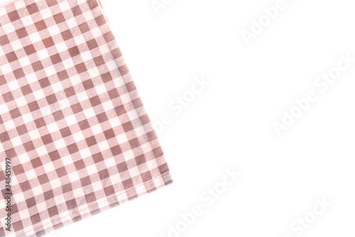 Kitchen towel or napkin over the white table. Close up.