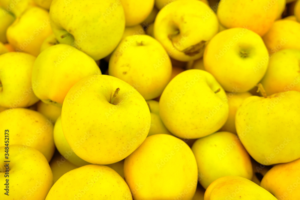 yellow apples on the market background or texture yellow apples on the market background or texture