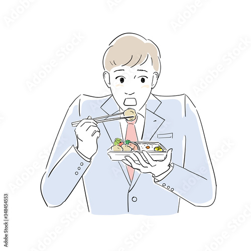 タイトル	お弁当を食べる男性社員