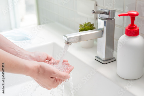 Fototapeta Naklejka Na Ścianę i Meble -  Wash hands to prevent virus