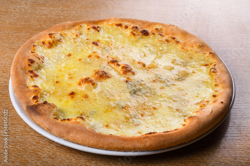 Quattro formaggi is a variety of Italian pizza topped with: mozzarella, gorgonzola, parmesan