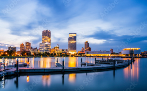 beautiful milwaukee  at night with reflection in water ,wisconsin,usa.