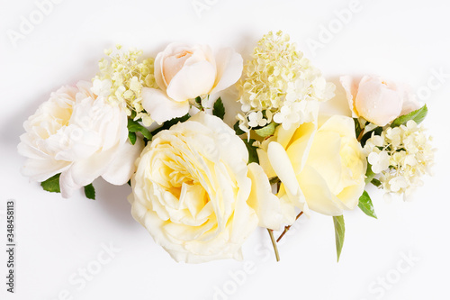 Festive flower composition on the white background. Overhead view