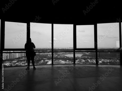 silhouette of a woman in a corridor
