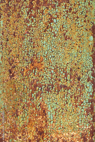 Vertical closeup of a heavily rusty iron surface
