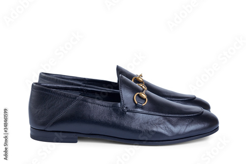 Men's lightweight shoes in fine blue leather with an elegant metal buckle insulated against a white background with shadow. Side view.