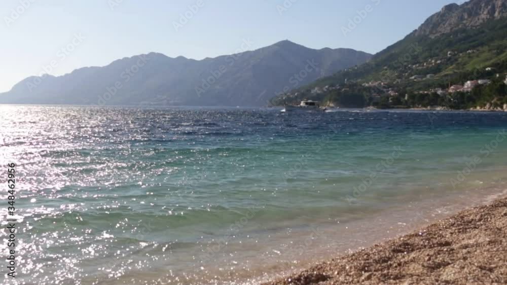 Punta Rata Beach in Makarska Riviera, Brela, Croatia at sunset time Punta Rata Beach in Makarska Riviera, Brela, Croatia at sunset time