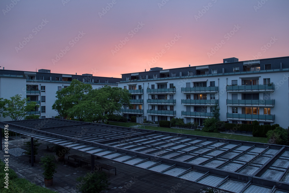 Naklejka premium spectacular sunset over over train station quarter in baar