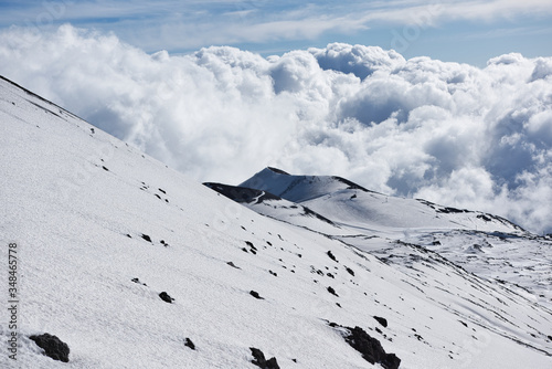 Snowy side of a volcano mountain in Sicily