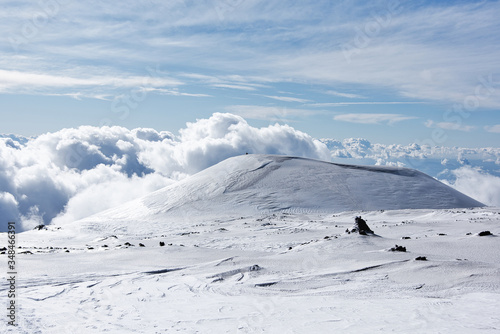 Snowy side of a volcano mountain in Sicily