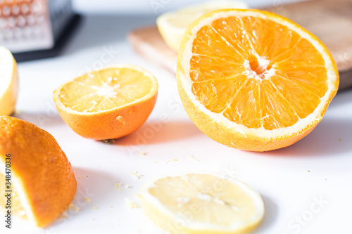Orange and lemon on a white background. Close up