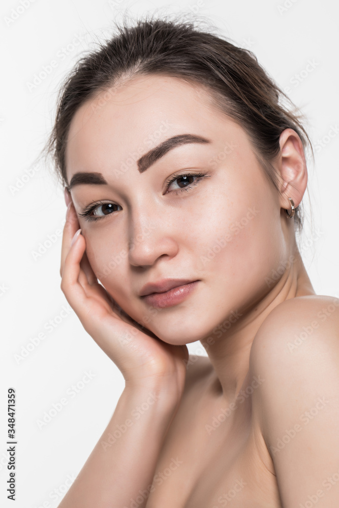 Beauty asian woman with clean fresh skin isolated on white background. Beauty asian woman with clean fresh skin isolated on white background.