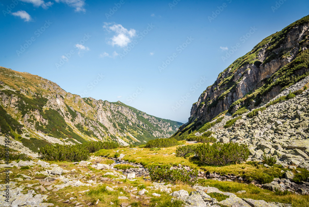 Beautiful mountain scenery in a sunny summer day. Rila mountain, Bulgaria. Hiking/ trekking concept.