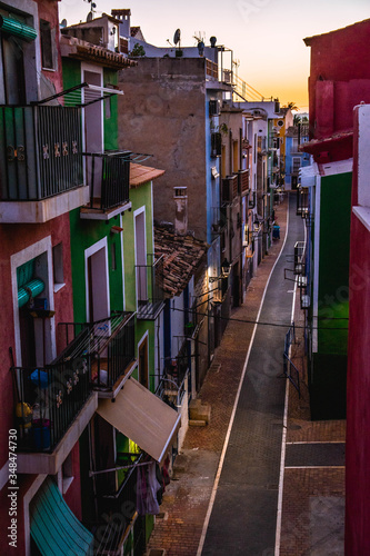 a small and colorful street seen from above of the small fishing village in Villajoyosa, Spain  © Diana