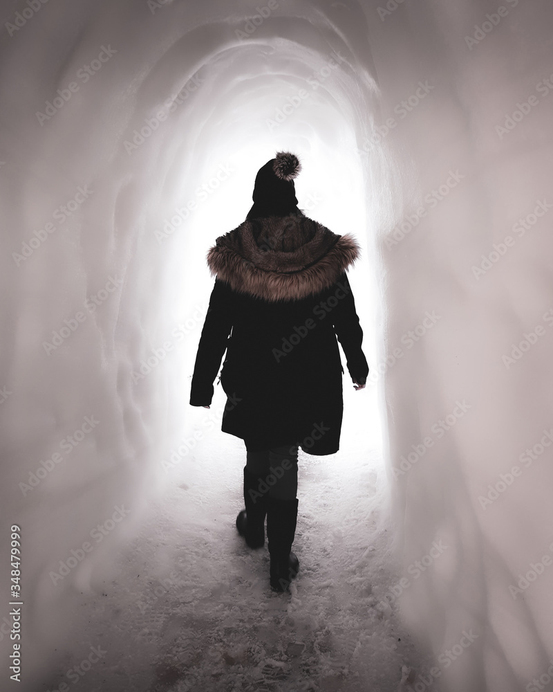 Woman in white snow cave in Zakopane Poland Woman in white snow cave in Zakopane Poland