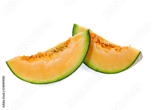 cantaloupe melon slices isolated on white background