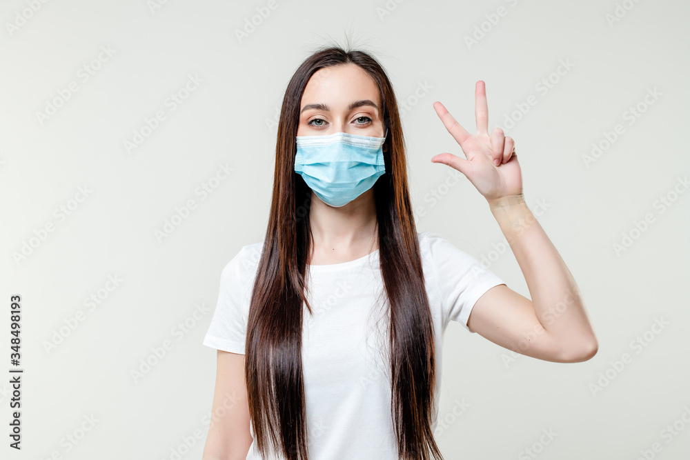 woman counting three fingers for step by step instruction isolated on white background woman counting three fingers for step by step instruction isolated on white background