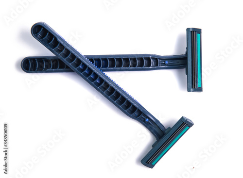 Blue men razor  isolated on white background photo