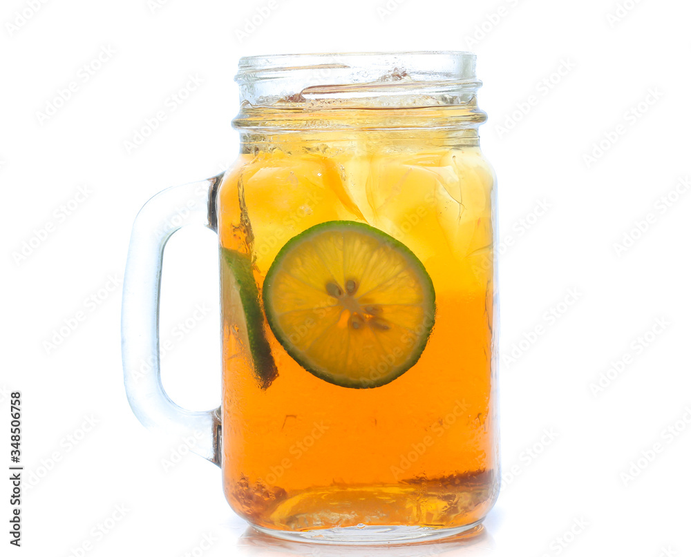 jar glass of iced tea with lemons isolated on a white background jar glass of iced tea with lemons isolated on a white background