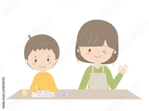 Boy studying with parents.