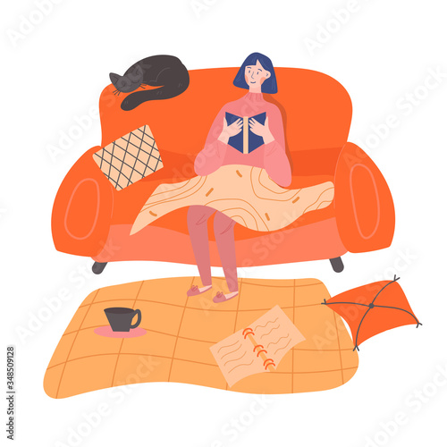 A girl is sitting on a sofa and reading an interesting book holding it in her hands. Warm and cozy atmosphere. Reading hobby concept. Flat vector colored illustration. Room interior design