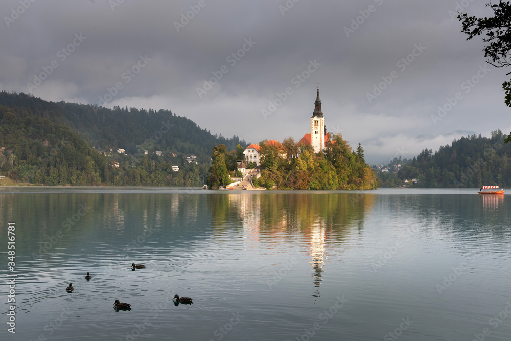 Morning view of famous lake Bled and small island with a church in Slovenia