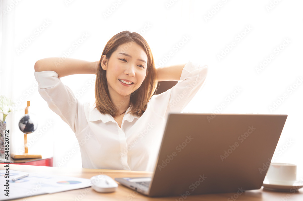 Young asian chinese ethnicity using laptop browsing,working,meeting or online learning at home Young asian chinese ethnicity using laptop browsing,working,meeting or online learning at home