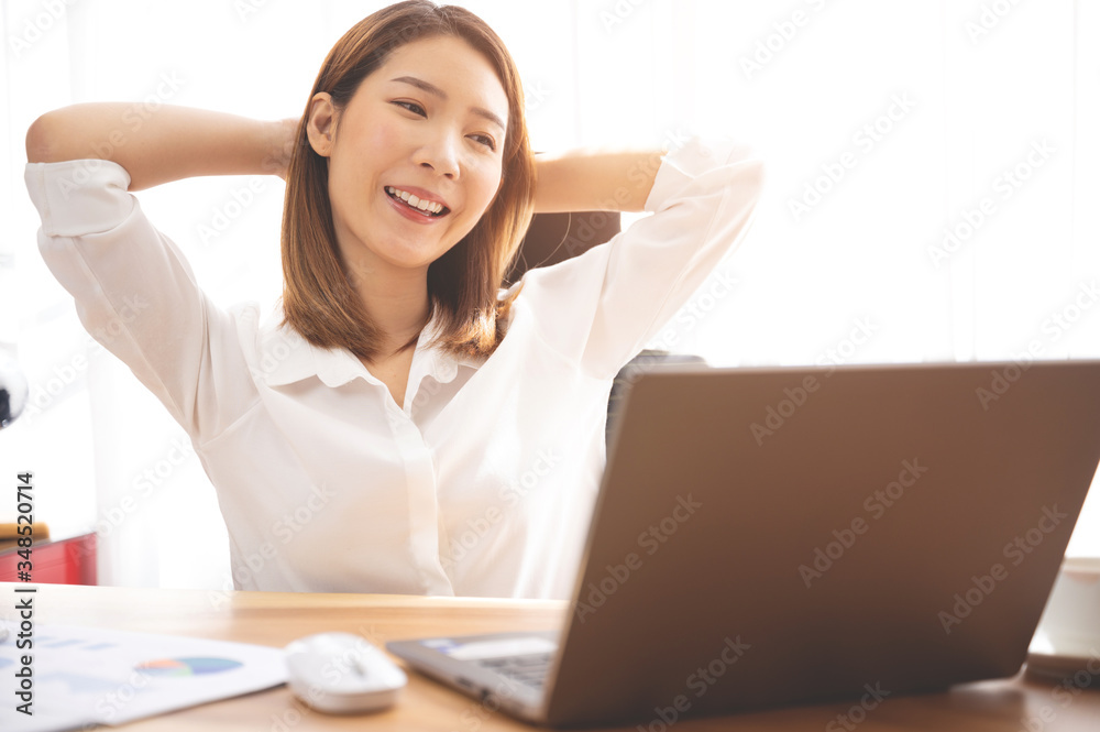 Young asian chinese ethnicity using laptop browsing,working,meeting or online learning at home Young asian chinese ethnicity using laptop browsing,working,meeting or online learning at home