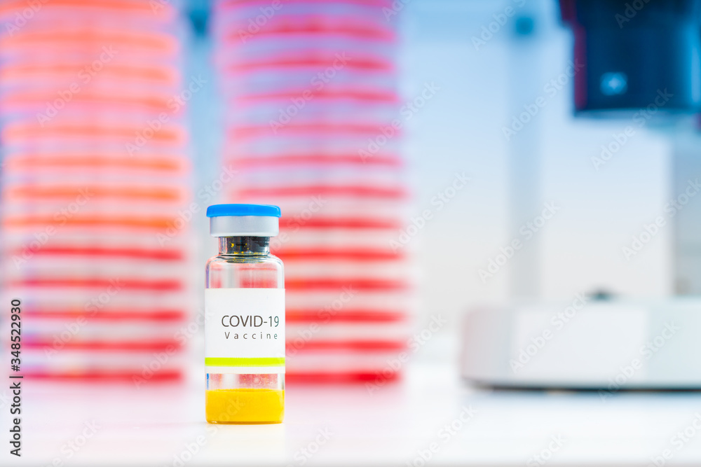 Close-up on laboratory vial Virus corona covid 19 vaccine. Research for new novel coronavirus immunization drug concept. Coronavirus COVID-19 vaccine vial