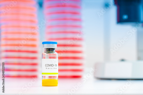 Fototapeta Naklejka Na Ścianę i Meble -  Close-up on laboratory vial Virus corona covid 19 vaccine. Research for new novel coronavirus immunization drug concept. Coronavirus COVID-19 vaccine vial