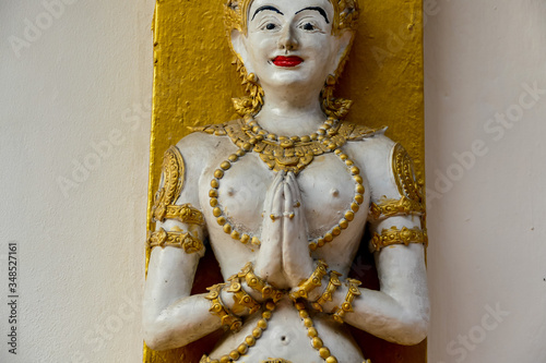 Canvas Print golden statue of buddha in thailand, digital photo picture as a background