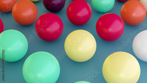 High quality trendy Colorful glossy marbles balls on faded blue background. For 3d illustration and other artistic concepts.