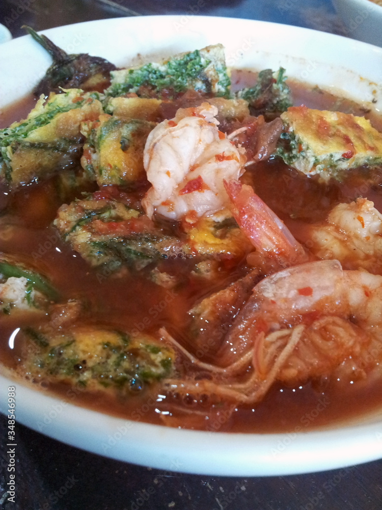 Acacia Pennata Omelet and Shrimp in Sour Soup made of Tamarind Paste, Yummy Thai Style Spicy Sour Soup called 