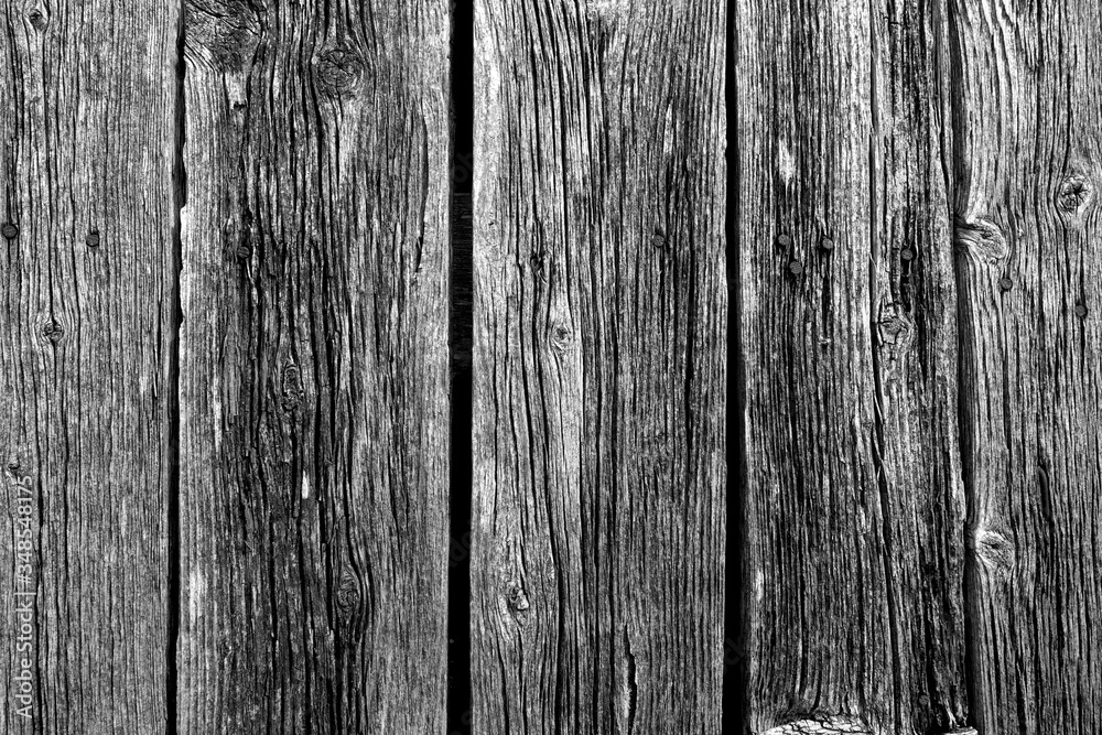 Weathered rustic wood planks with nails. Contrasted black and white style Weathered rustic wood planks with nails. Contrasted black and white style