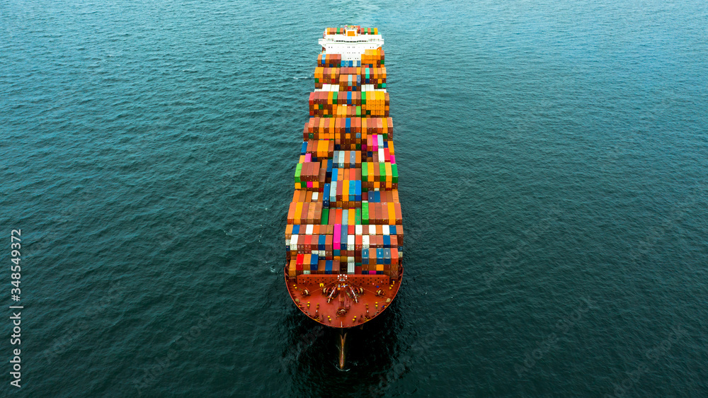 Container cargo ship import export global business worldwide logistic and transportation, Container ship supply chain crisis, logistic crisis, Aerial view container cargo vessel boat freight ship. Container cargo ship import export global business worldwide logistic and transportation, Container ship supply chain crisis, logistic crisis, Aerial view container cargo vessel boat freight ship.