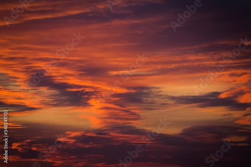 cloudy orange sky in the sunset © comex975
