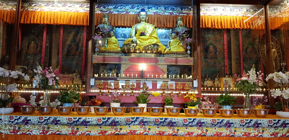 Buddha with Tibetan Water Offering in Bowls