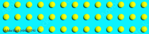 Trendy pattern made of tennis ball on blue green mint background. Sport tennis layout. Flat lay. © IrynaV