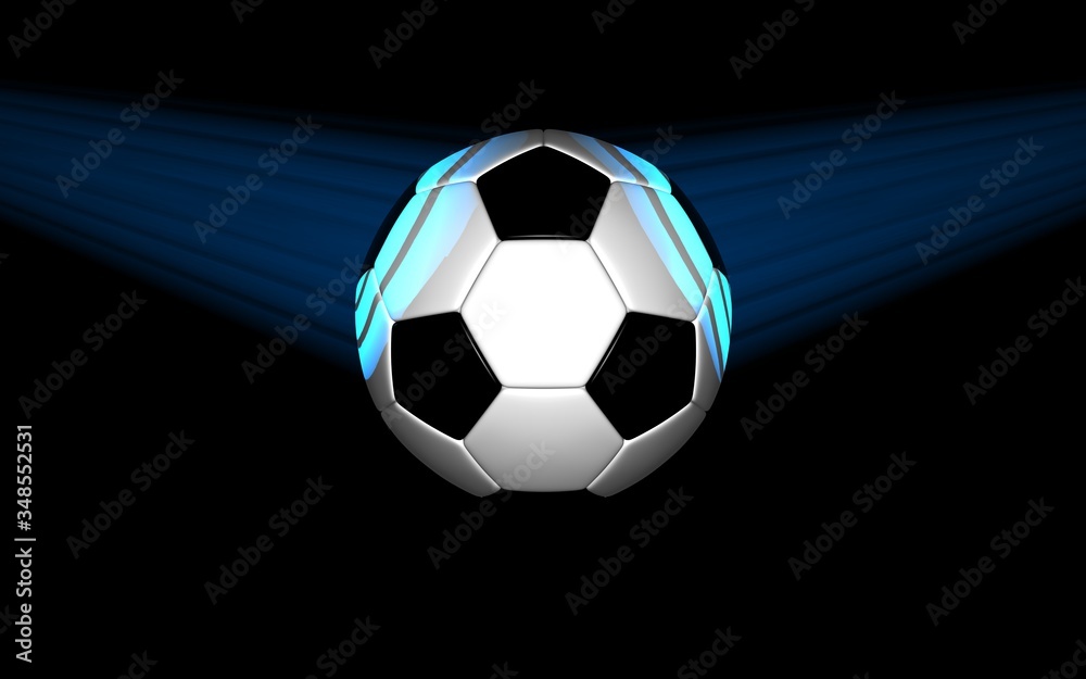 Naklejka premium soccer ball lit by light on black background