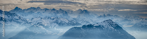 delightful panoramic view from rigi into swiss snowy alps © Pascal