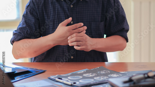 Blurred image,The doctor is diagnosing the tumor picture or cancer from the x-ray film of the patient's brain in order to plan treatment with tumor surgery or cancer from the patient's brain photo