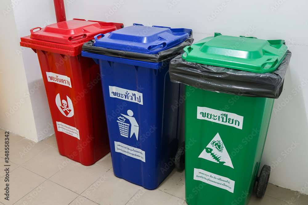 Types of trash bin isolated in the garbage room foto de Stock Adobe Stock