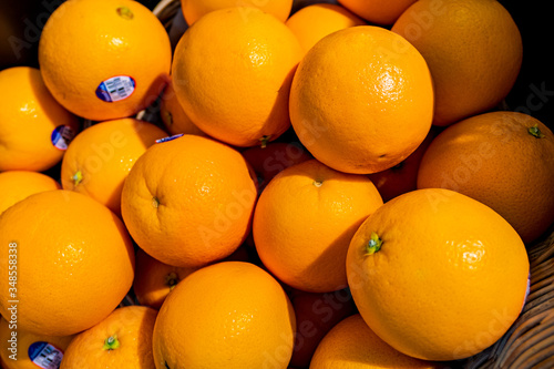 Many Sunkist oranges photo