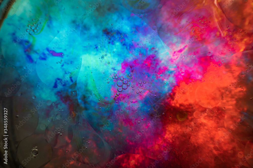 Mixed colour blurred background with scattered bubbles