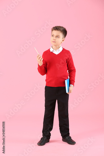 Thoughtful little pupil on ...