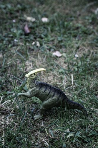 parasaurolophus dinosaur in green grass background jurassic world © robin-clouet.fr