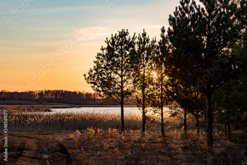 Russia, sunset on spring lake