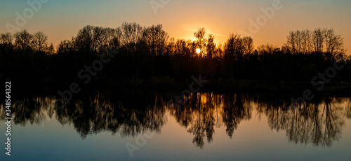 Beautiful sunset with reflections near Niederpöring, Isar, Bavaria, Germany © Martin Erdniss