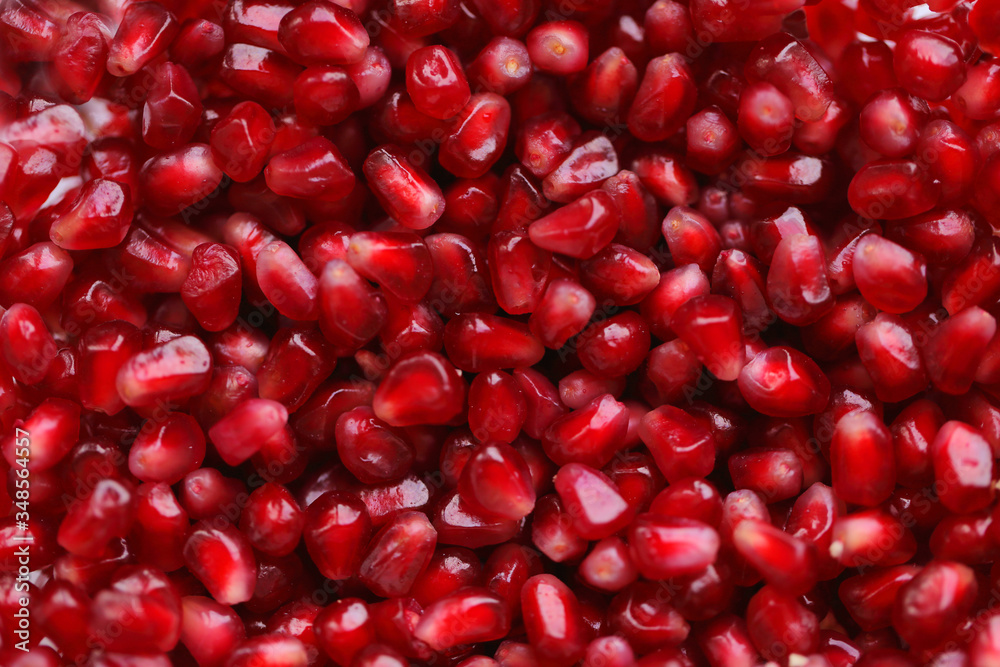 Background of many fresh organic pomegranate seeds, macro photography Background of many fresh organic pomegranate seeds, macro photography